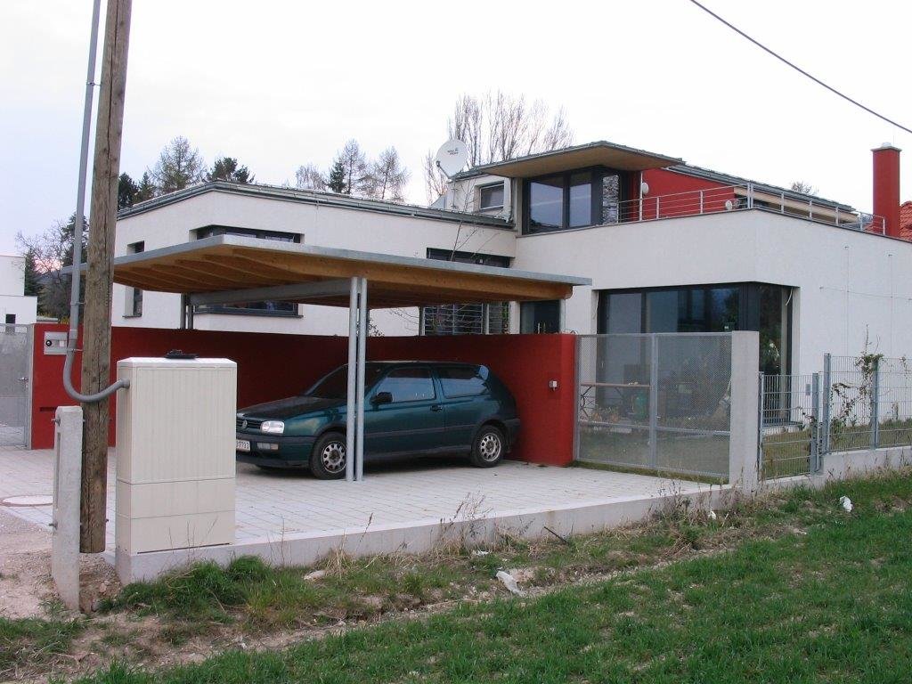 Carport aus Metall und Holz von Wallmüller Dachdeckerei und Holzbau 